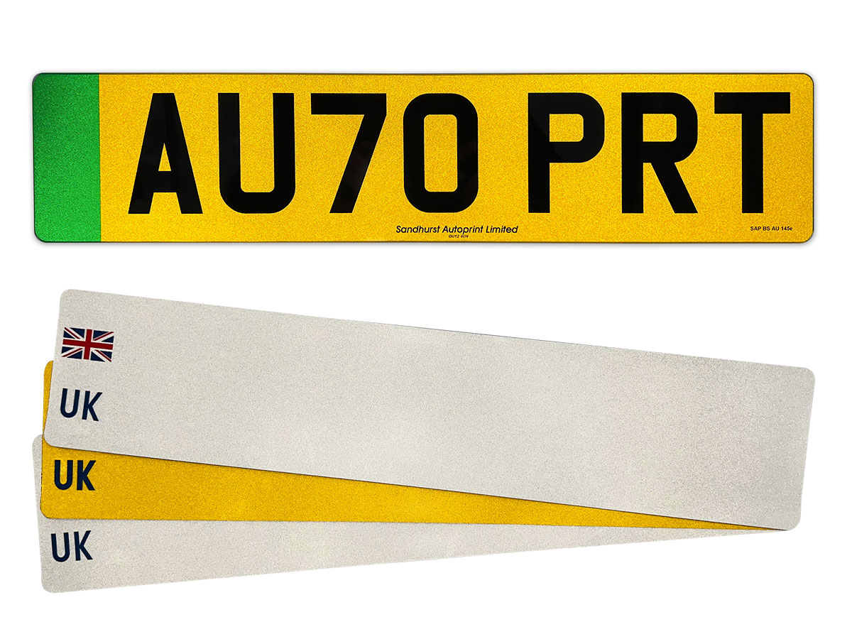 A finished yellow plate above white and yellow UK reflective sheets