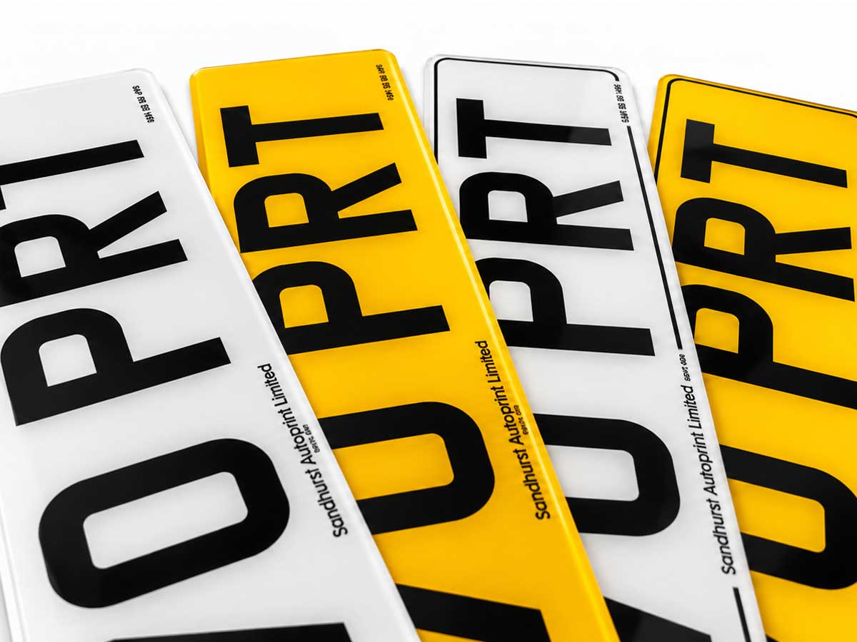 A stack of finished number plates from a production run