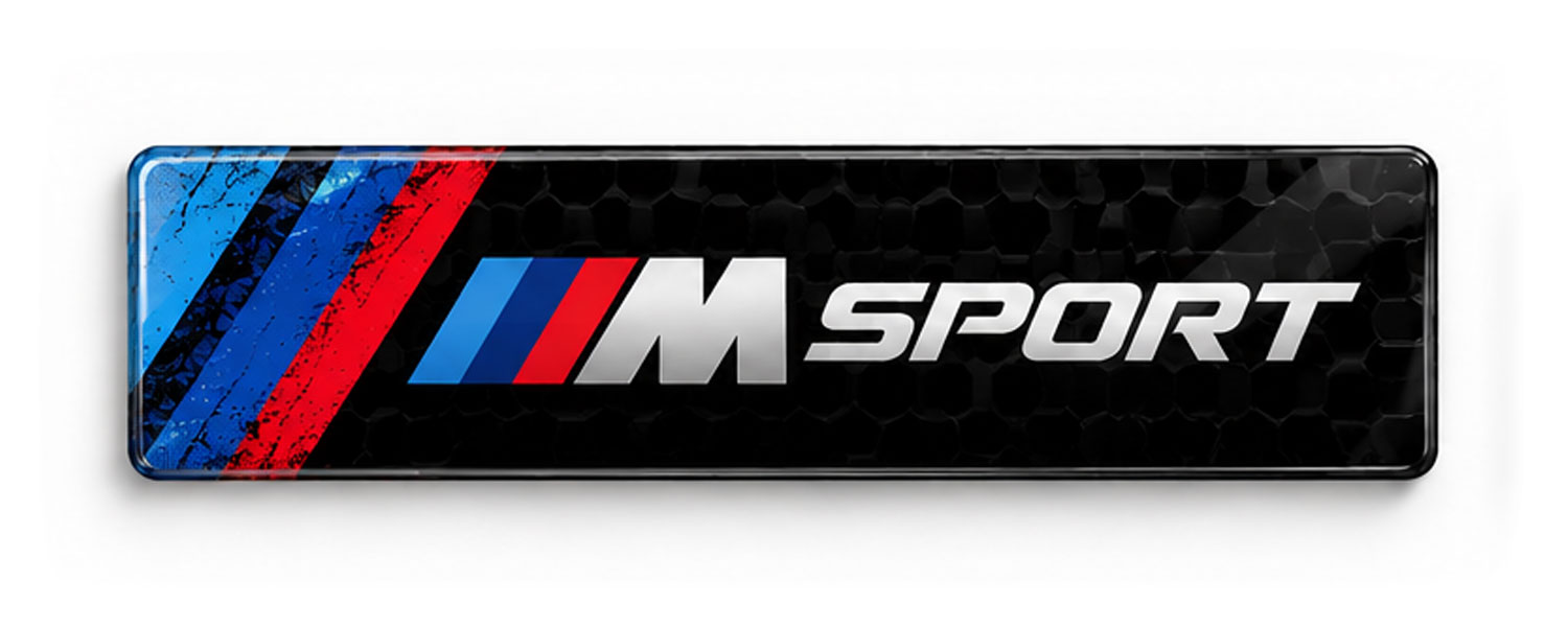 M Sport show plate with tricolour stripes on a black honeycomb background