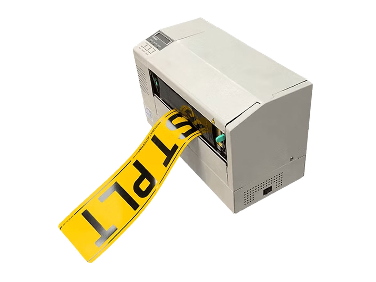 TEC large format printer producing a yellow rear number plate